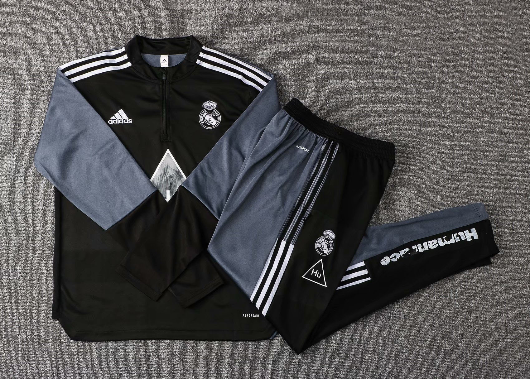 Real Madrid x Human Race Black Soccer Training Suit Youth 2021/22 